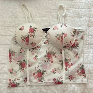 I’m selling this cute floral bustier corset top because it doesn’t fit me